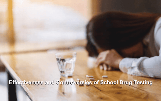 The girl lieing on the table with pills and water glass next to her